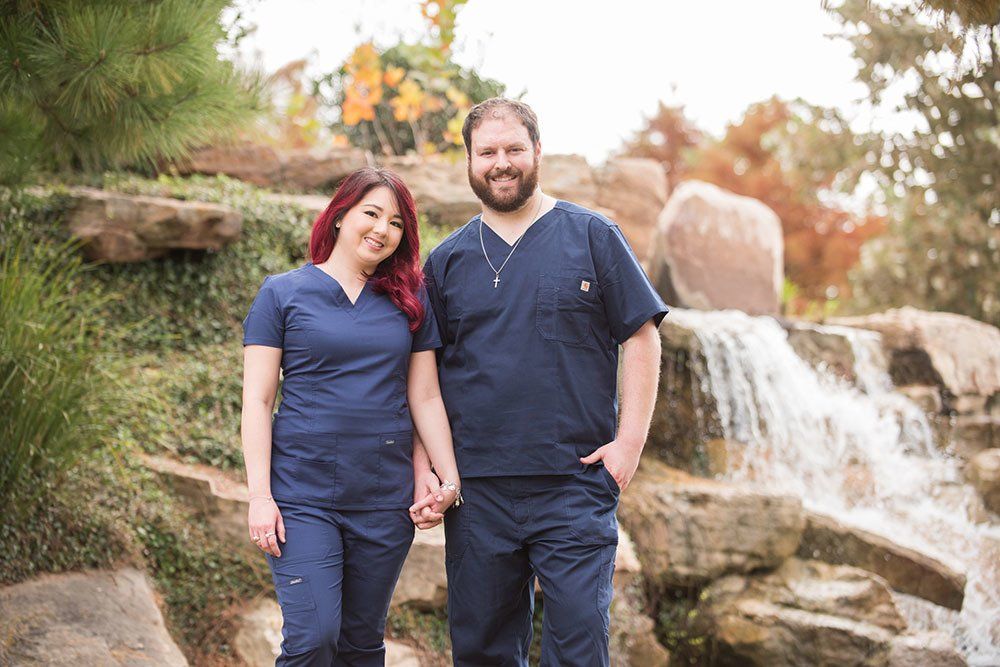 Doctors posing for picture - A Couple of Vets