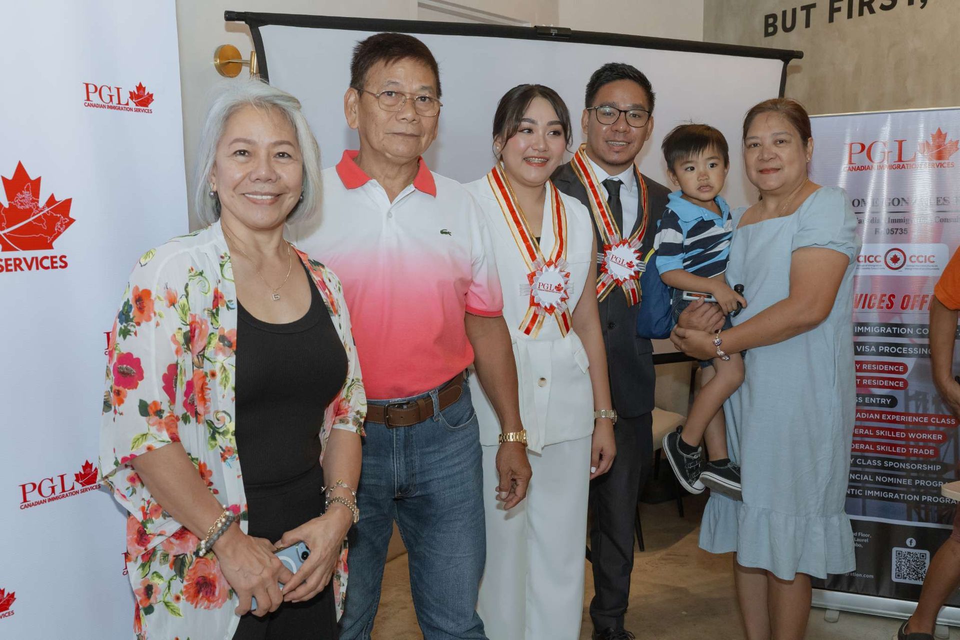 A group of people are posing for a picture together.