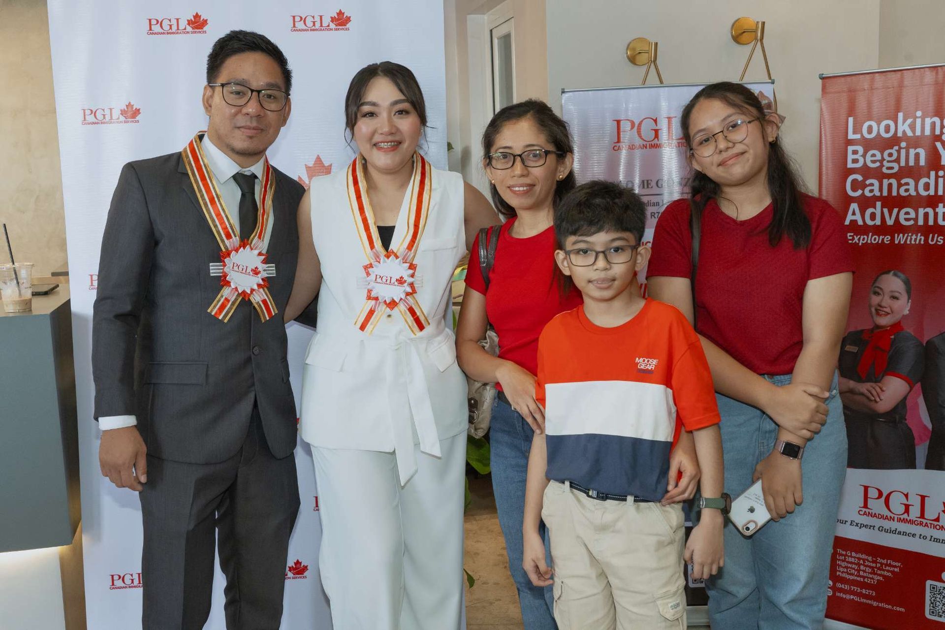 A group of people are posing for a picture together.