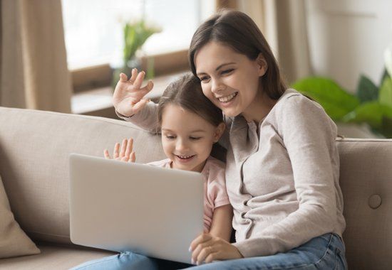 Happy Mom with Daughter Make Video Call — Cleburne, TX — DigiTex.com