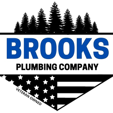 Logo for Brooks Plumbing Company, featuring a blue text on a white backdrop, with a silhouette of trees above, and an American flag below.