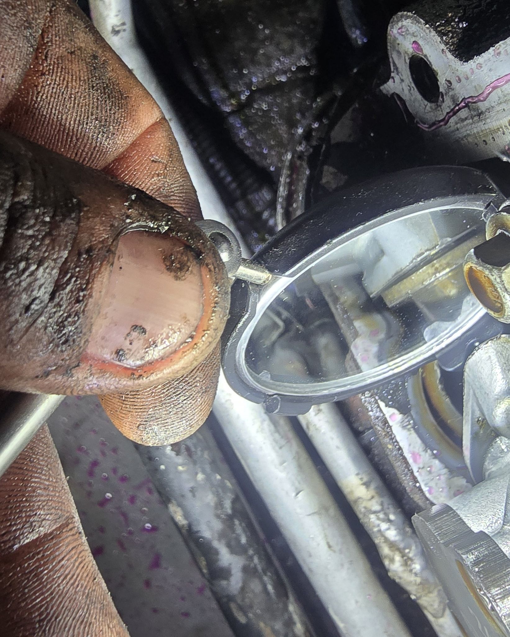 Hand Using Inspection Mirror to View a Vehicle Component — Chester's Mechanical & Performance in Tamworth, NSW