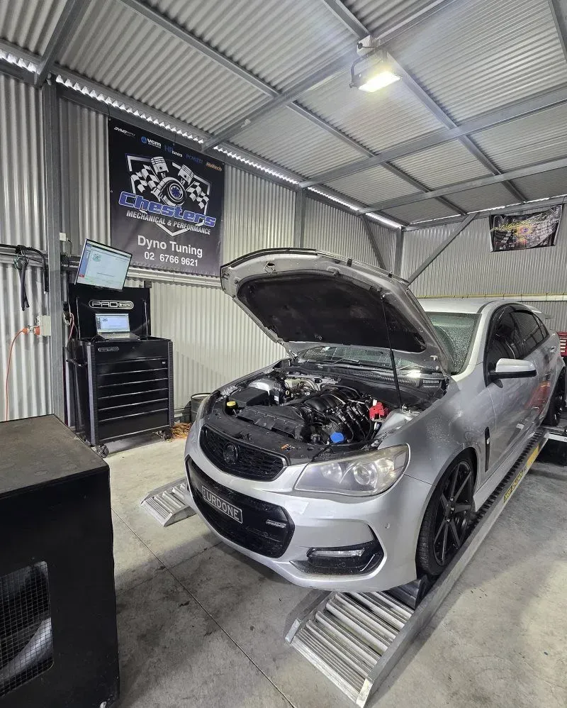 Silver Car on a Dyno in a Garage With Its Hood Open — Chester's Mechanical & Performance in Tamworth, NSW
