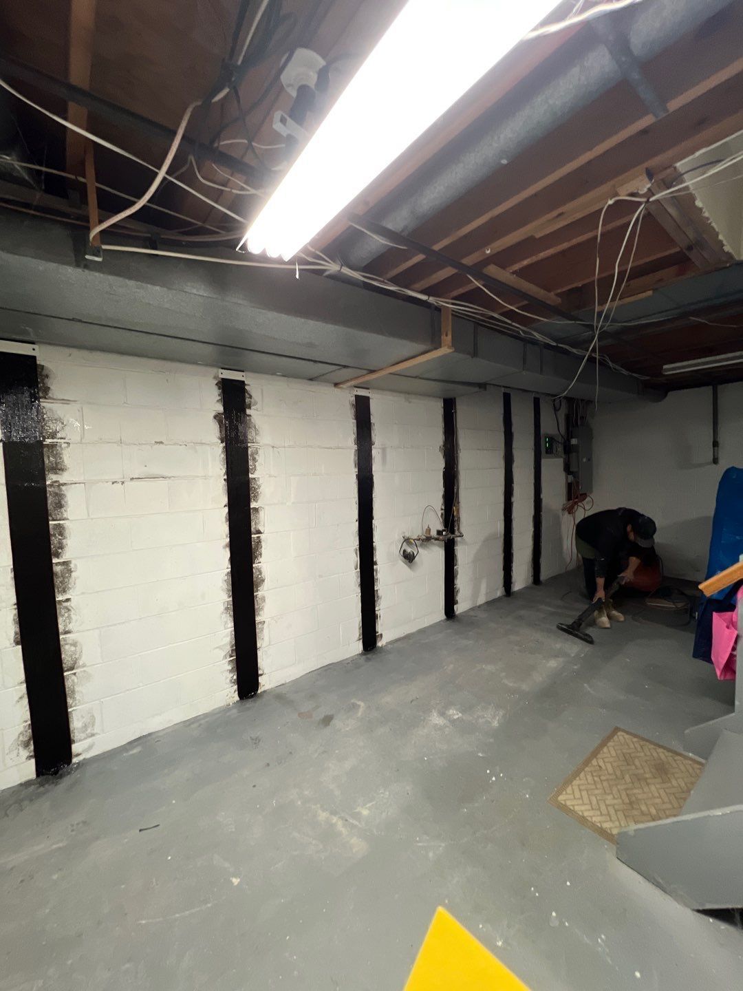 Carbon Fiber Straps Reinforcing a Bowing Cinderblock Wall