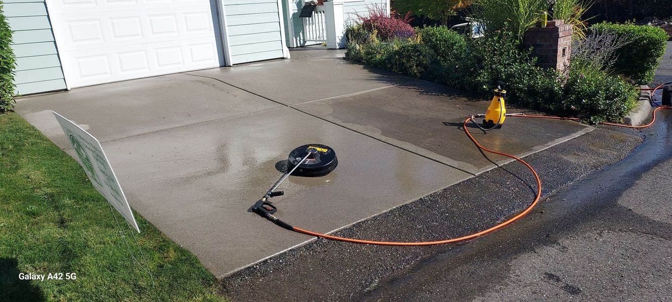 Gold-colored window squeegee, on a white background.