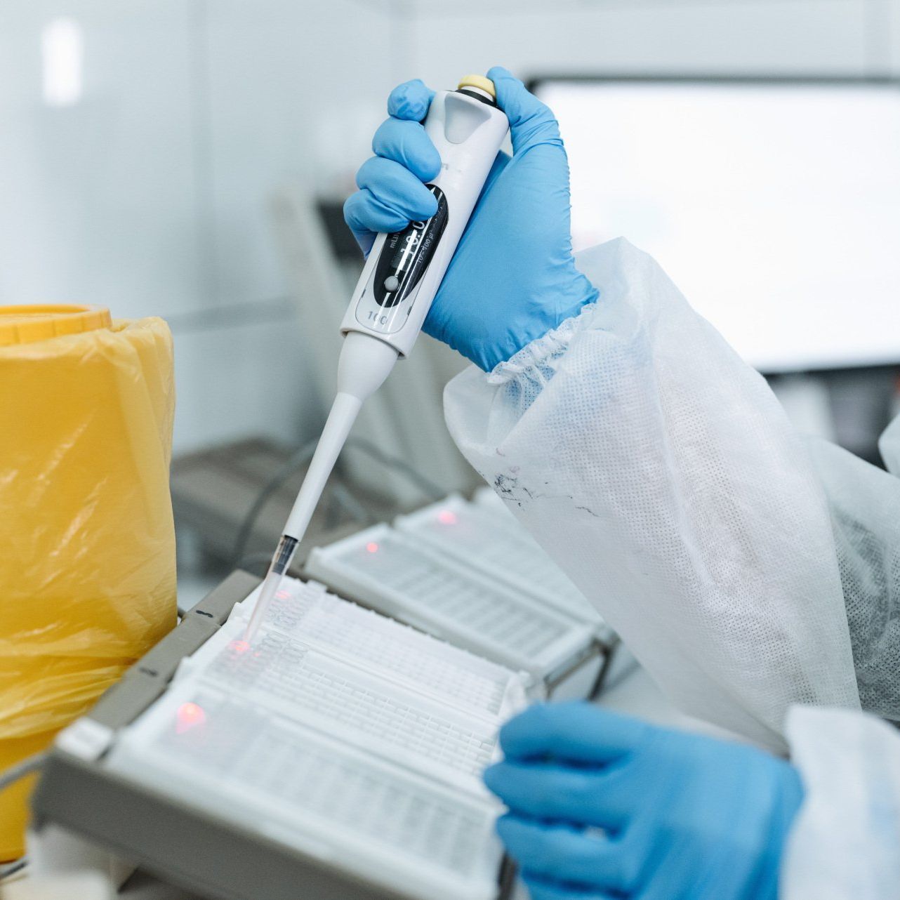 Person using lab equipment