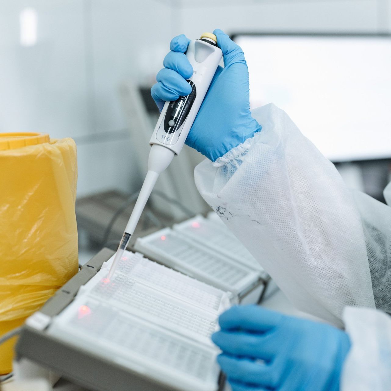 Person using lab equipment