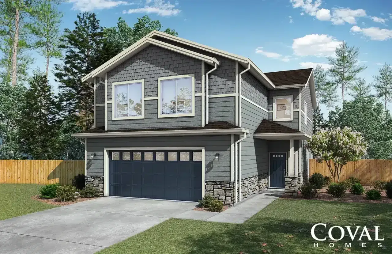 Two-story gray house with attached garage, front porch, and landscaped yard under a blue sky