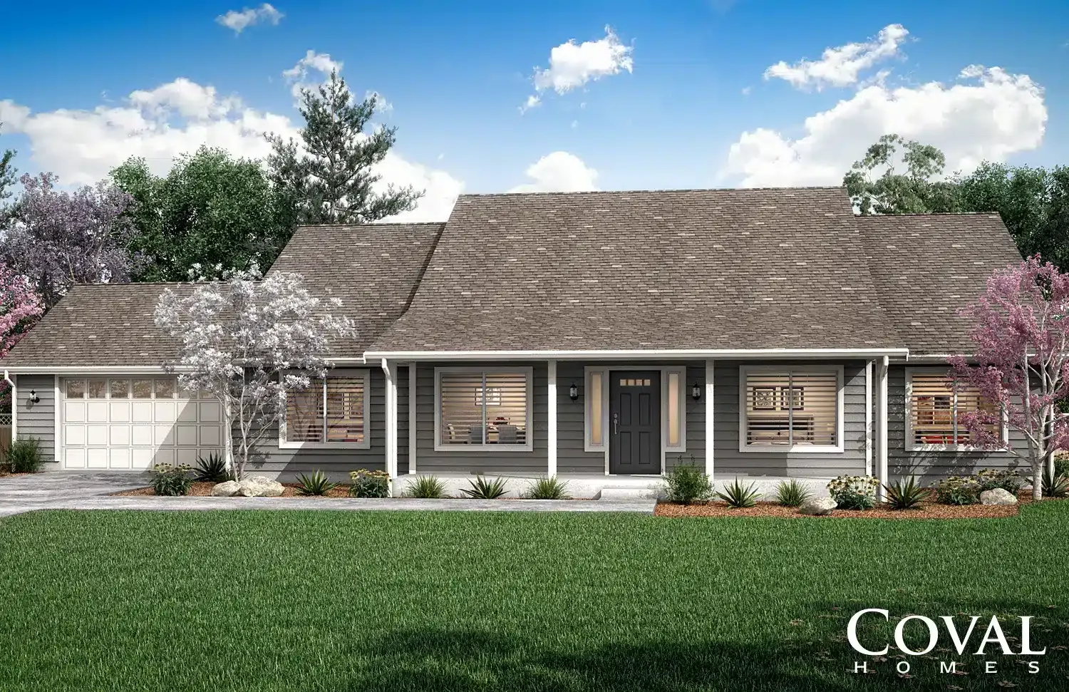 Single-story suburban house with gray siding, porch columns, and landscaped front yard under a blue sky