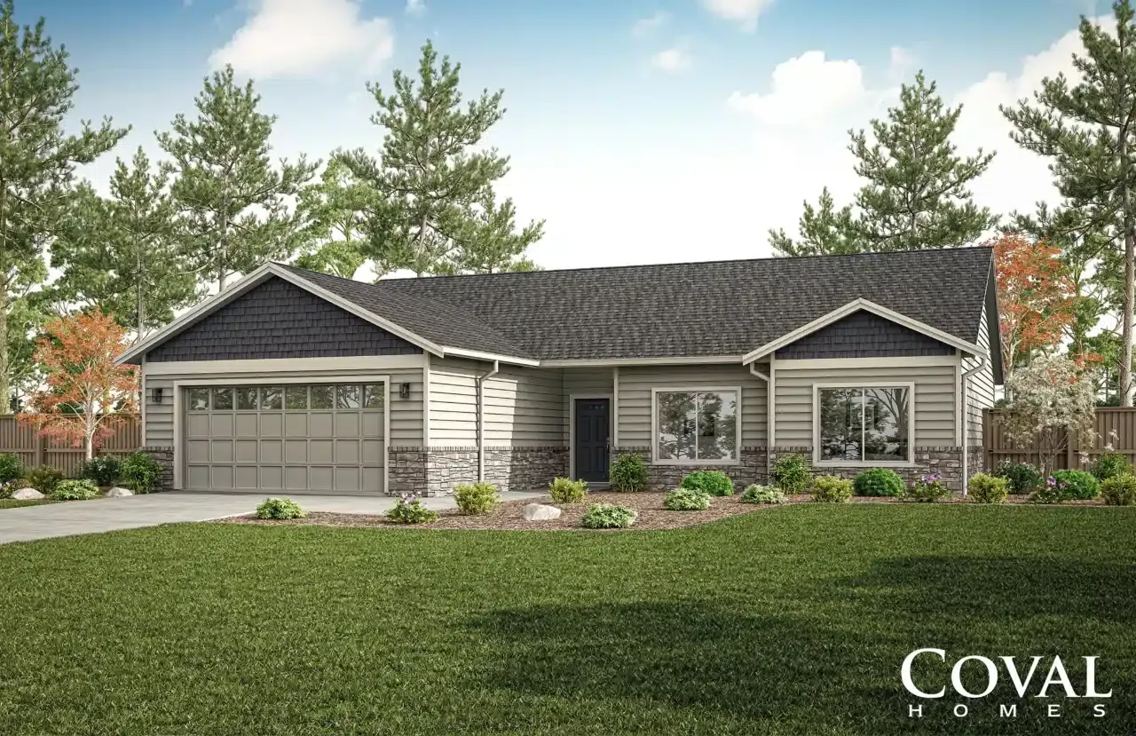 Single-story gray suburban house with a two-car garage, front lawn, and landscaped yard