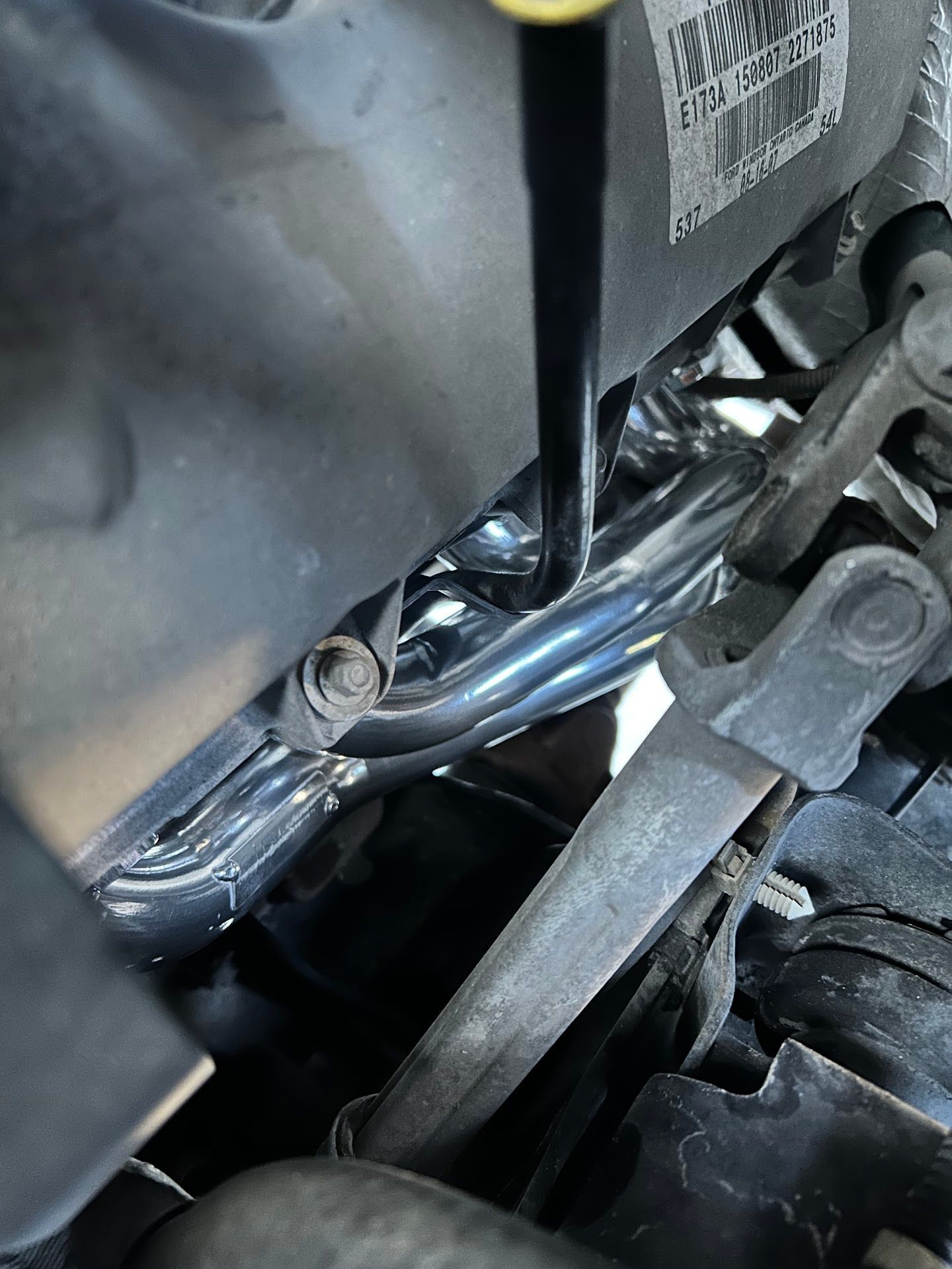 Car engine compartment | American Muffler & Auto Repair