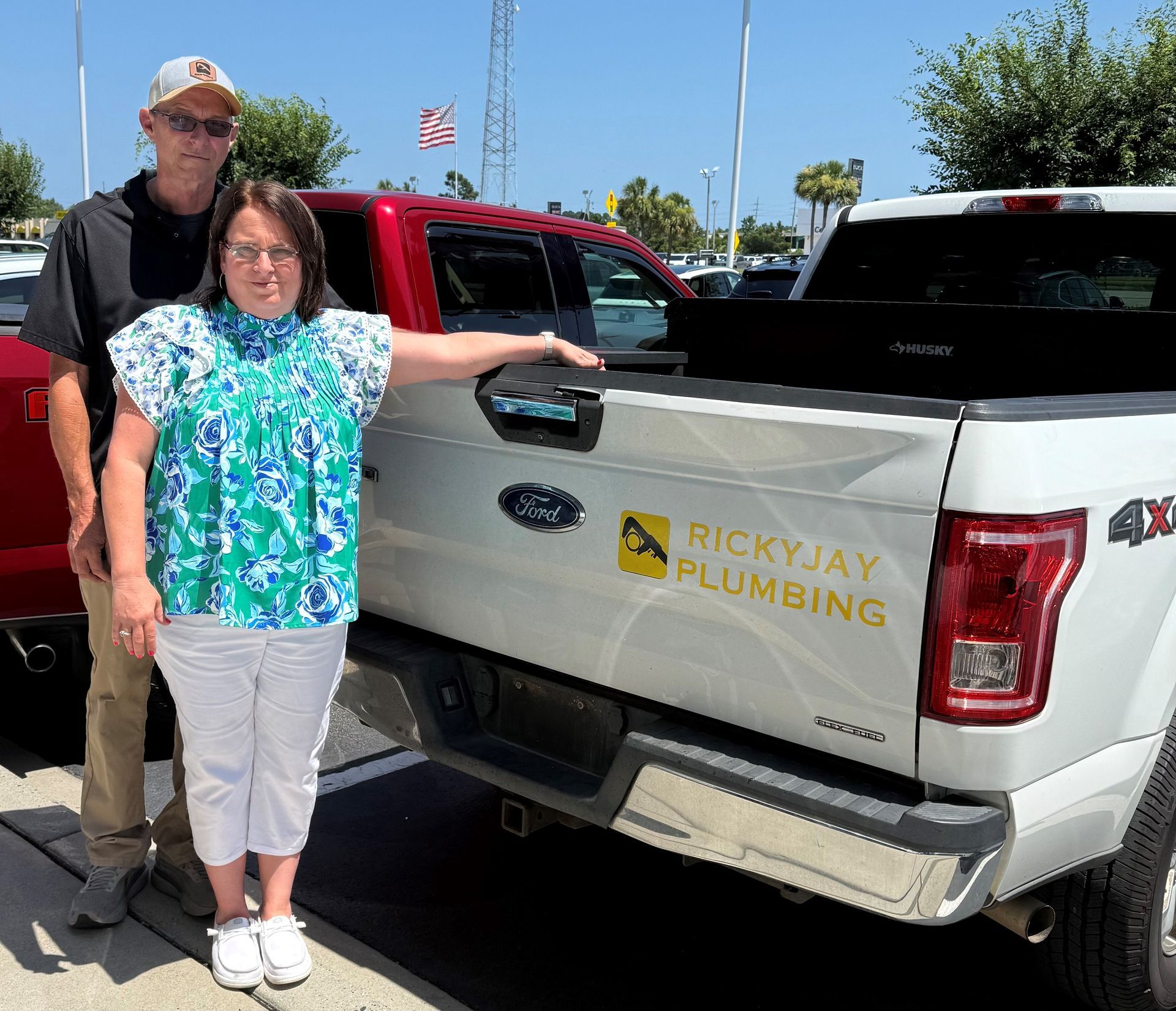 A gray circle with a white silhouette of a person in it.
