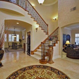 interior view of living room, dining room and staircase