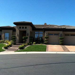 modern house exterior view with blue sky on background