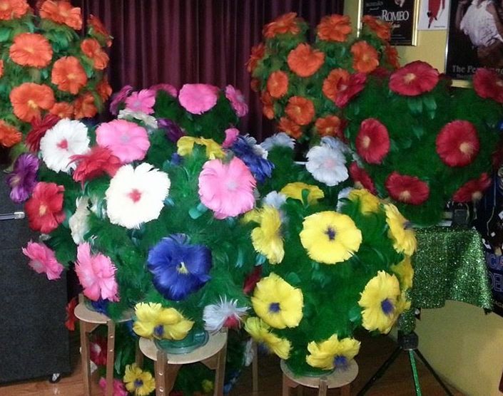 A bunch of colorful flowers are sitting on a table