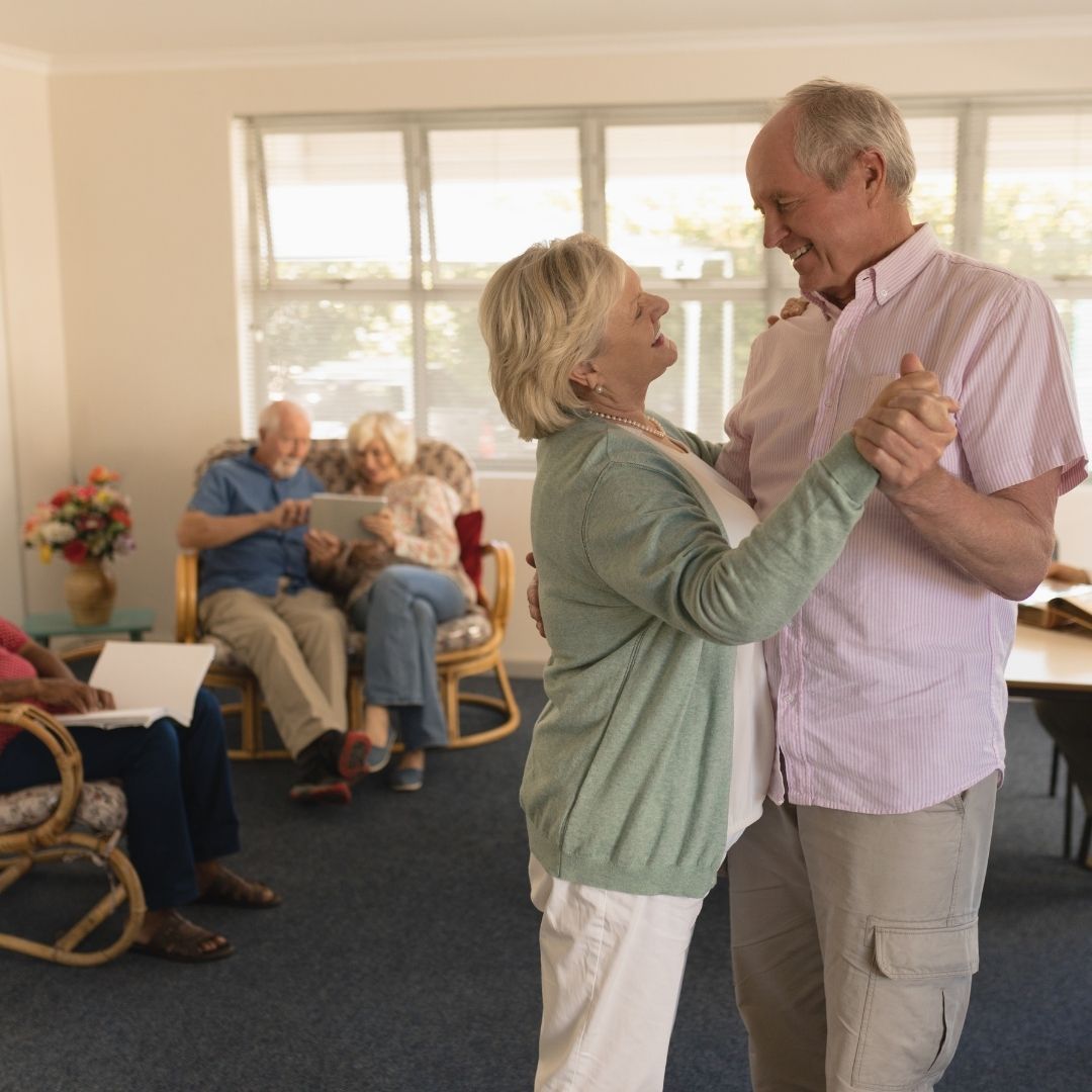 elderly couple dancing