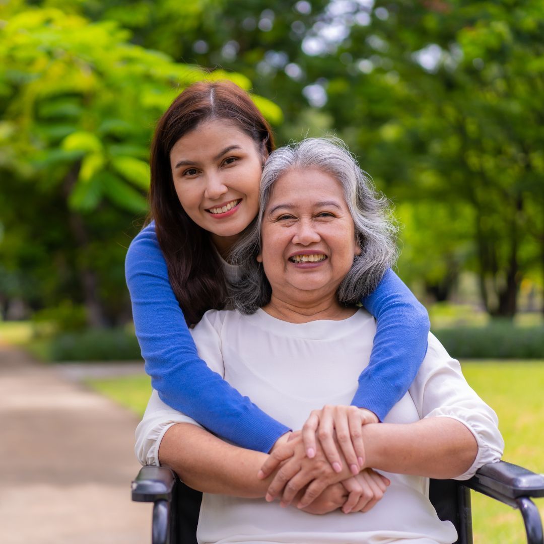 person hugging senior