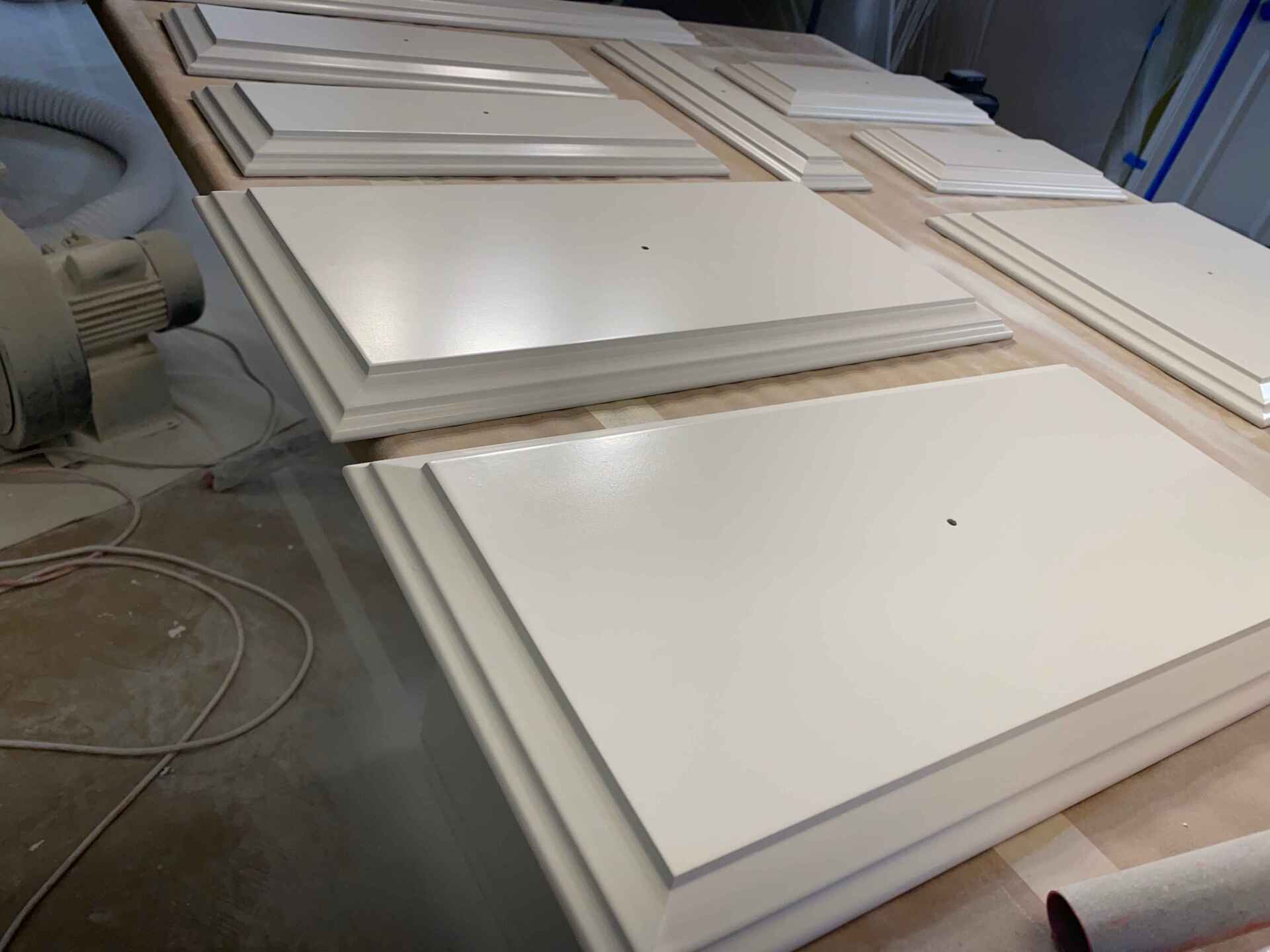 Cabinet doors laid out for painting in Medfield, MA