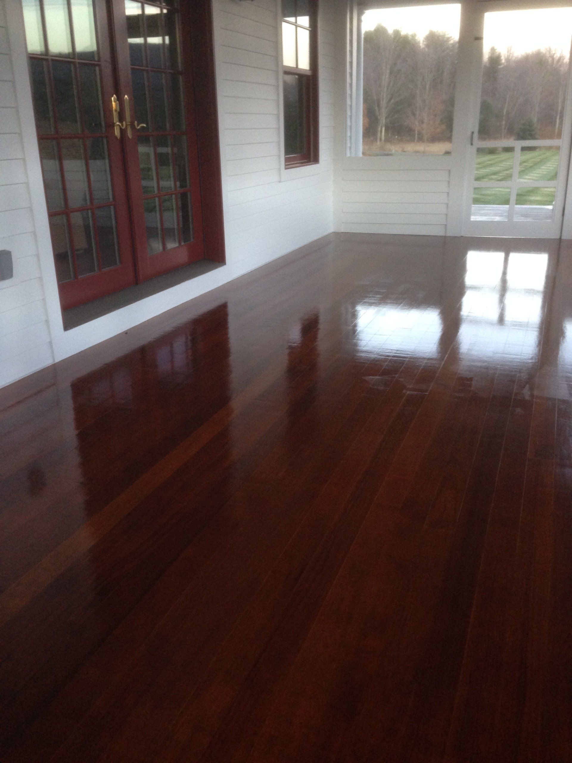 Porch or deck refinished with brown stain