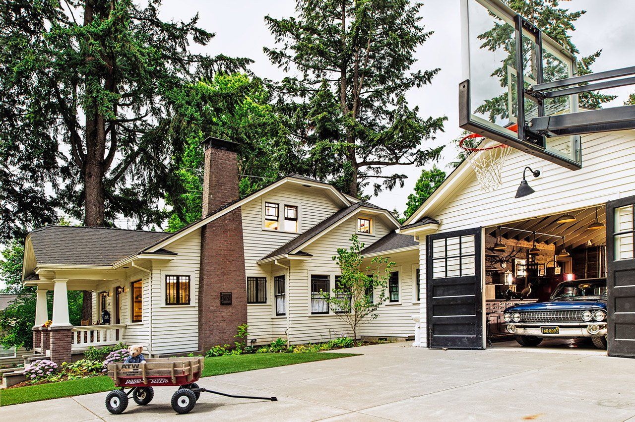 Street view of a 1920’s bungalow with a roomy, open garage in Lake Oswego