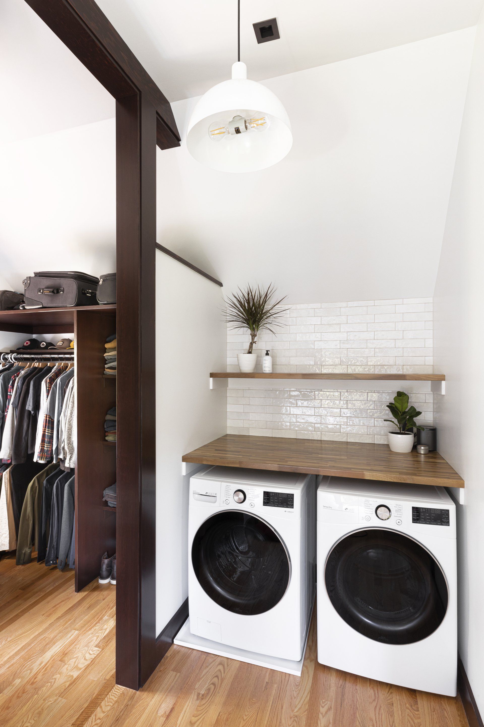 The laundry space and main closet are adjacent to the main bathroom
