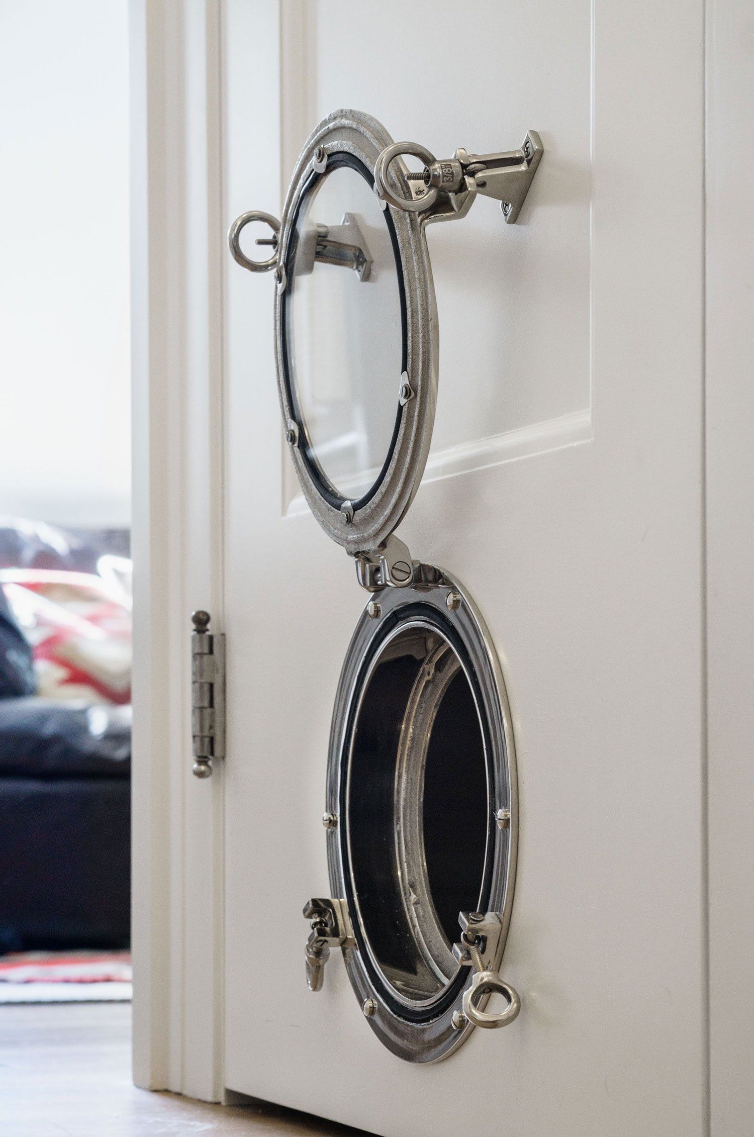 The new porthole in the bottom rail of the kitchen door serves as a cat door.
