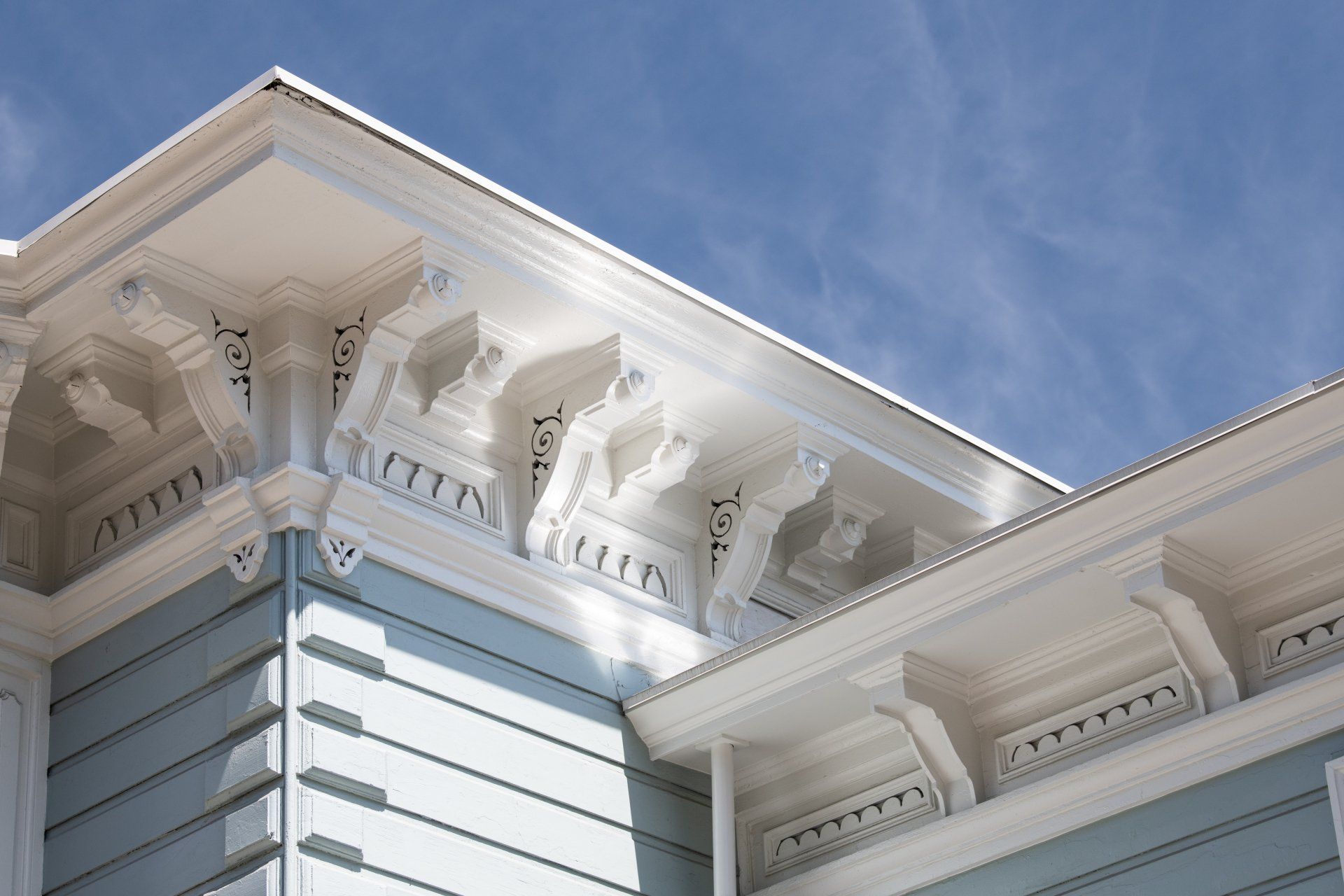 Decorative corbels at the eaves were restored when possible or replicated by hand by our skilled carpenters.