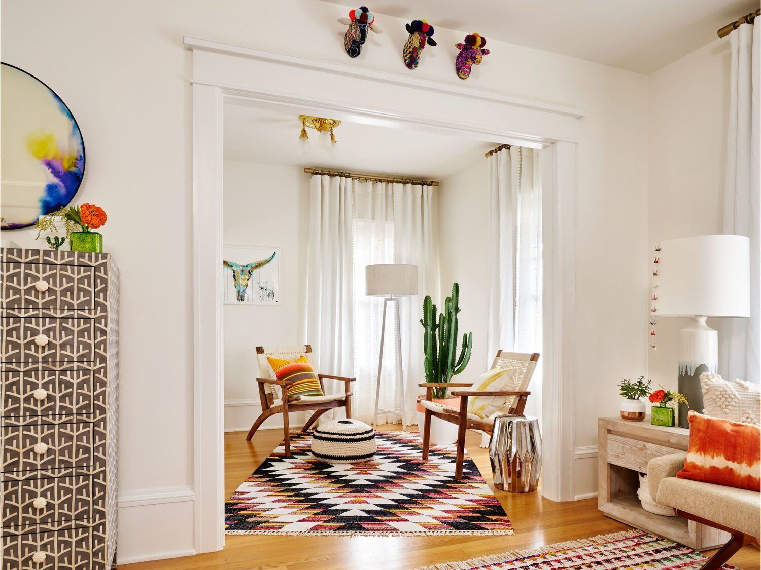 We made a bedroom into a dressing room and closet, and we added custom brass and spruce clothing racks.
