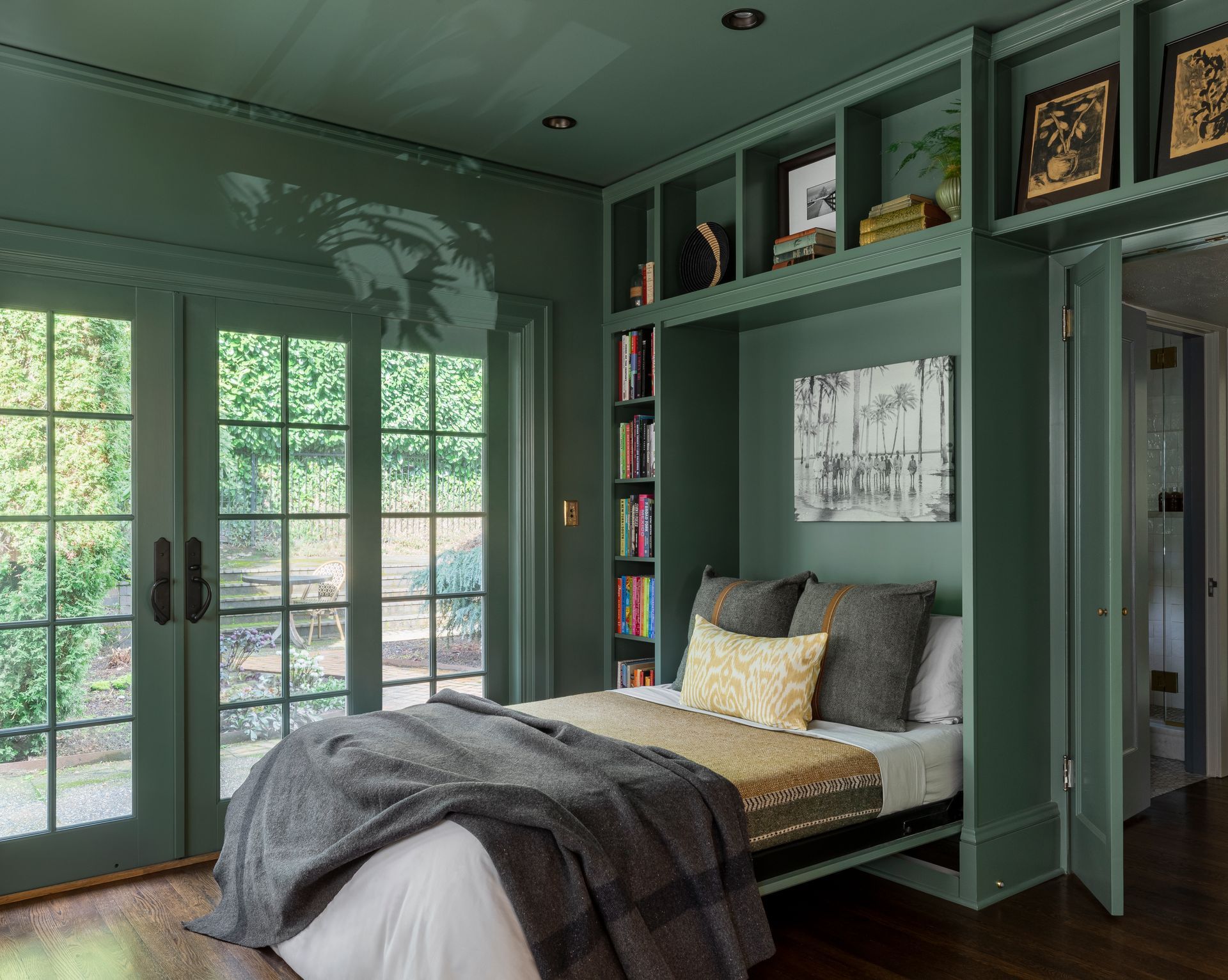 The room hugs you in comforting greens, inside and out, whether you're reading, studying or resting.