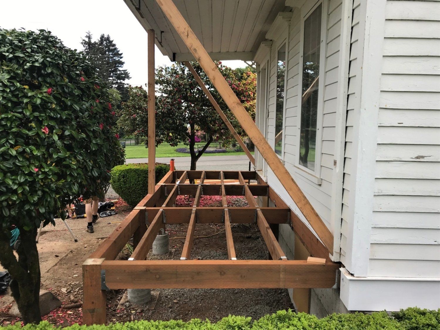 Caple House porch repair being rebuilt