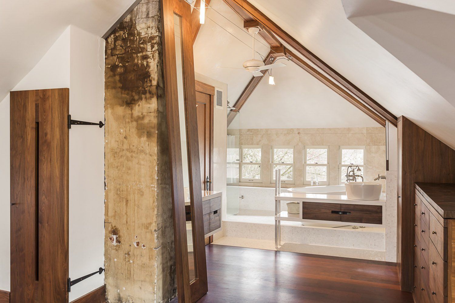 The 3rd floor’s walnut millwork & Jatoba floors lend warmth to the main suite