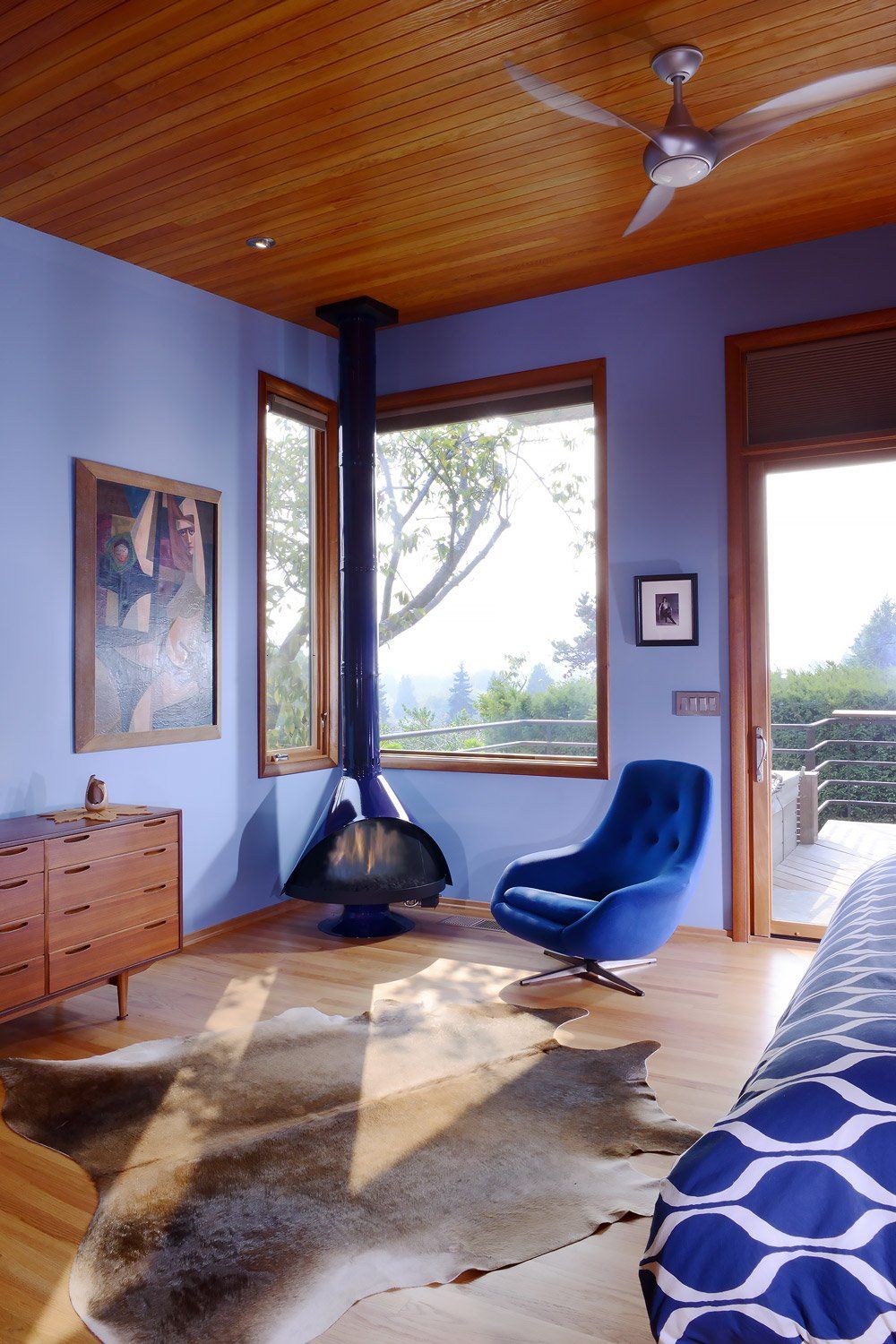 The master bedroom boasts custom built-ins & a MALM Gas Zircon fireplace.