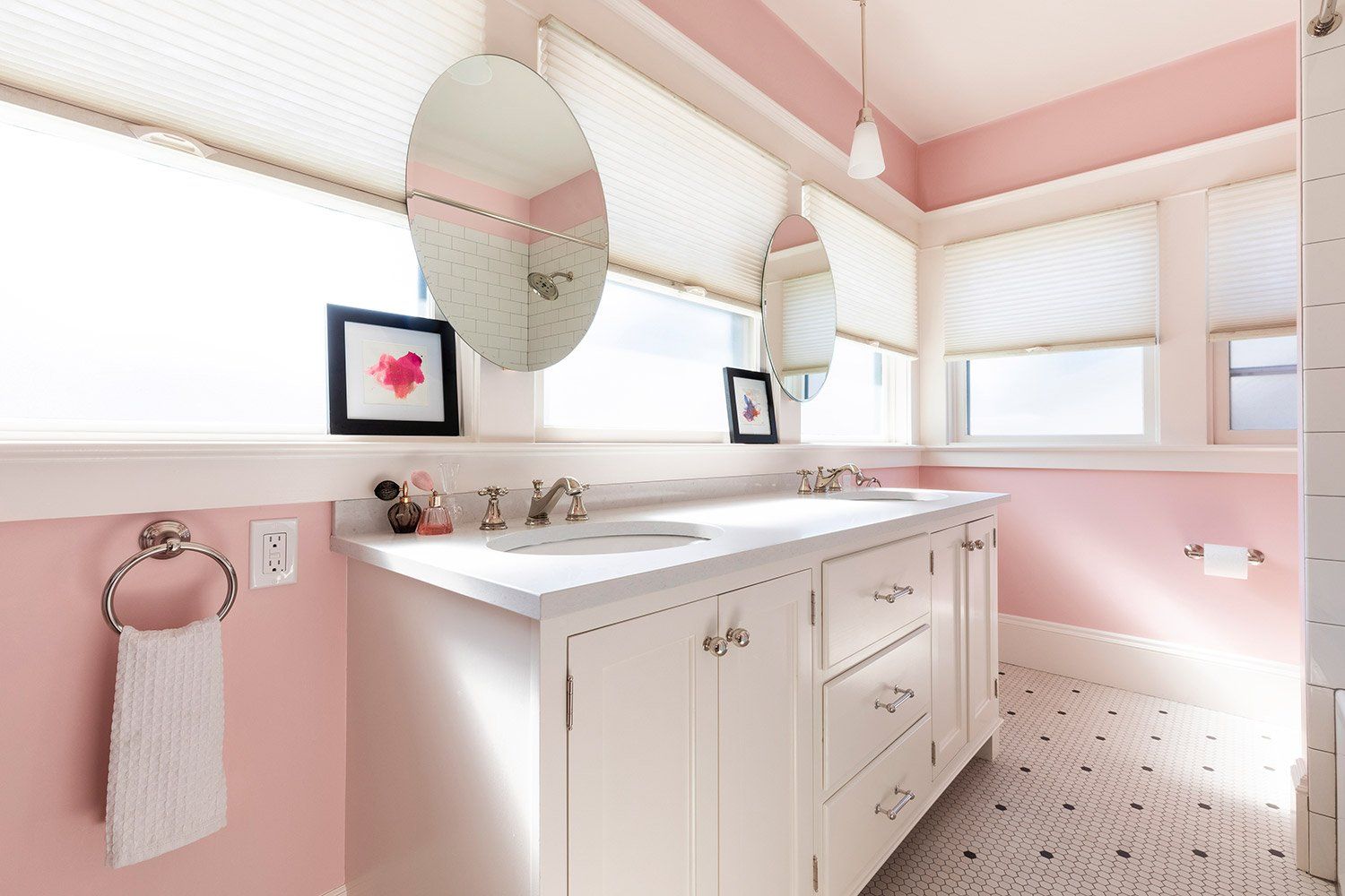 The second floor has a new bath for the kids, full of natural light and painted a cheery pink