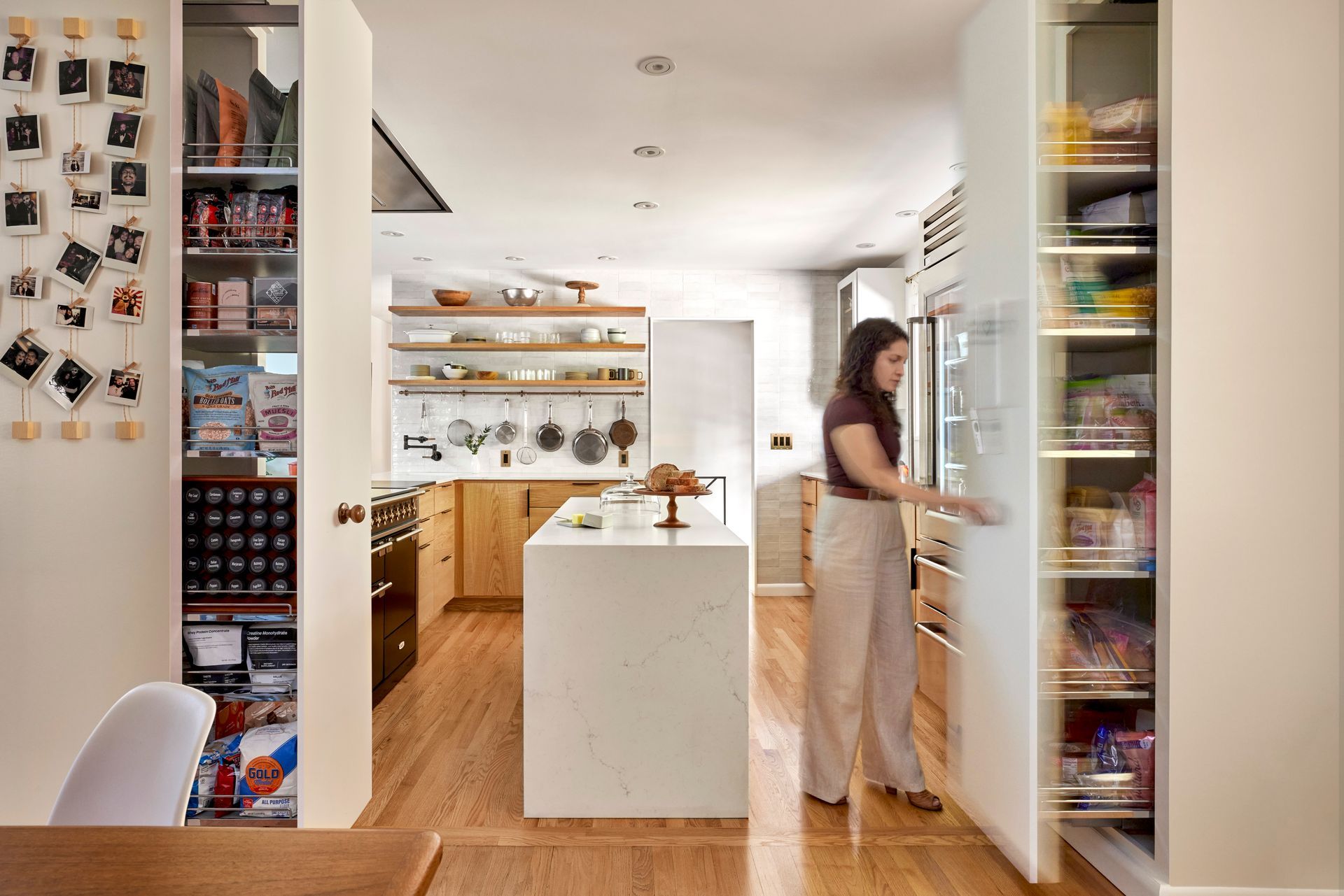 The pull-out bins are accessible from both sides, keeping everything in sight. 