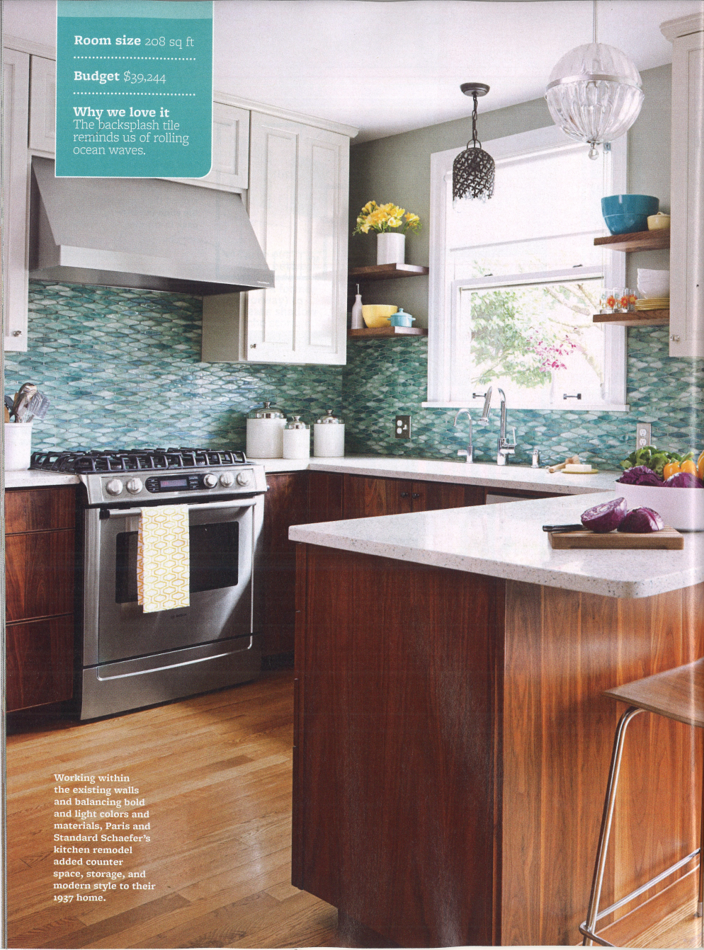 A kitchen with a stove a sink and a window
