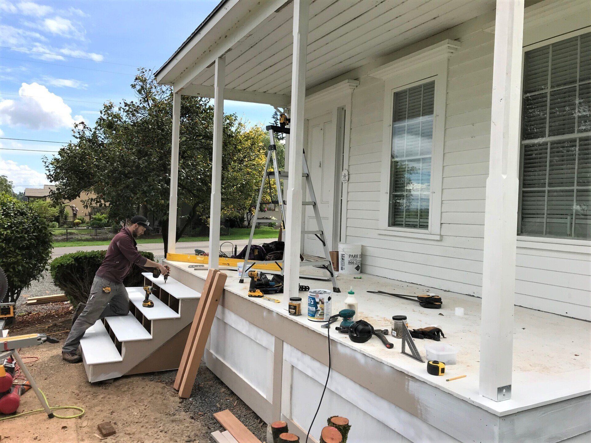 Carpenter Taurin Skinner-Maginnis creates a beautiful new, safe porch for the Caples House Museum