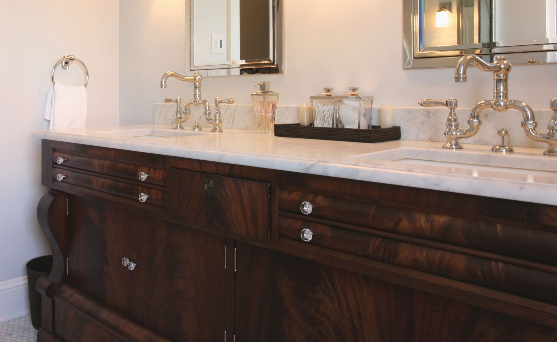 Close up of the antique cabinet-turned-vanity in the main bath.