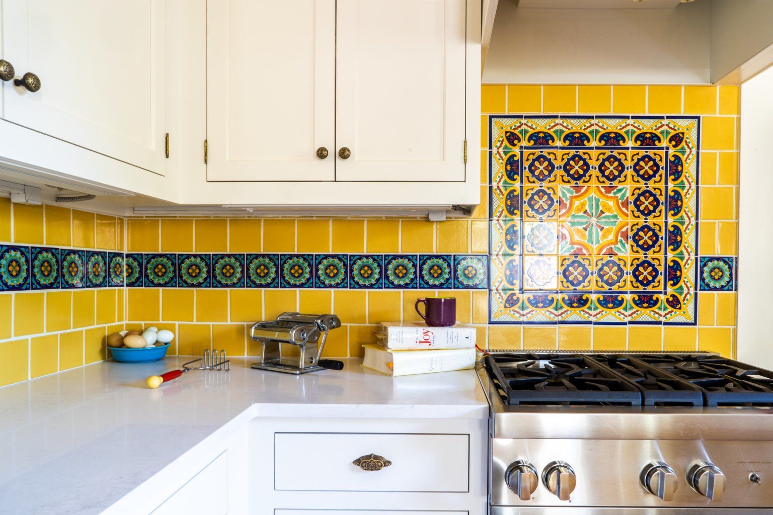 After: paying attention to the fine details is what sets ARCIFORM apart from other design build firms. Decorative tile by Tierra y Fuego. Yellow field tile by Fireclay.