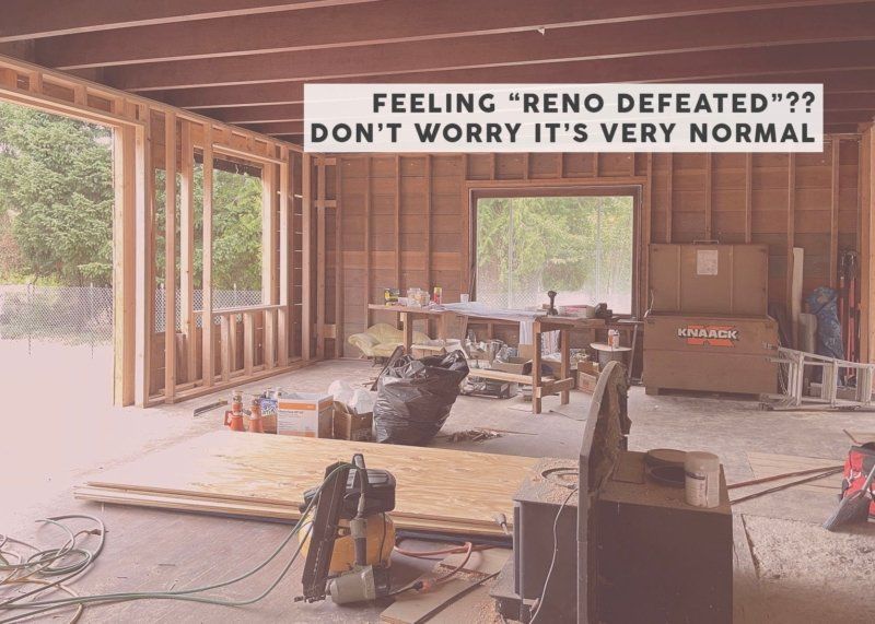A building under construction with a lot of tools and a vacuum cleaner.