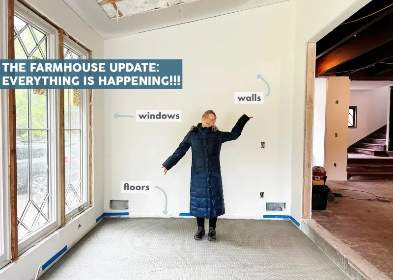 A woman is standing in a room with the words