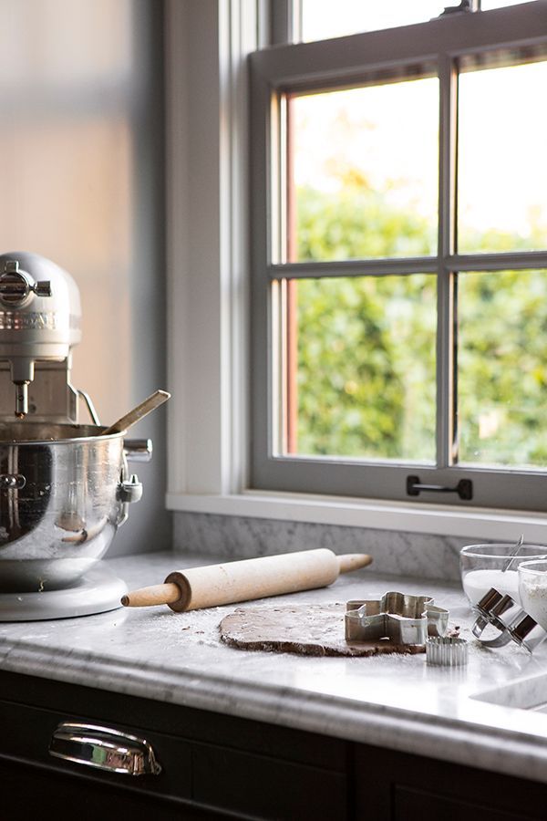 This special baking area has a large window, Carrara marble countertop and plenty of storage below.