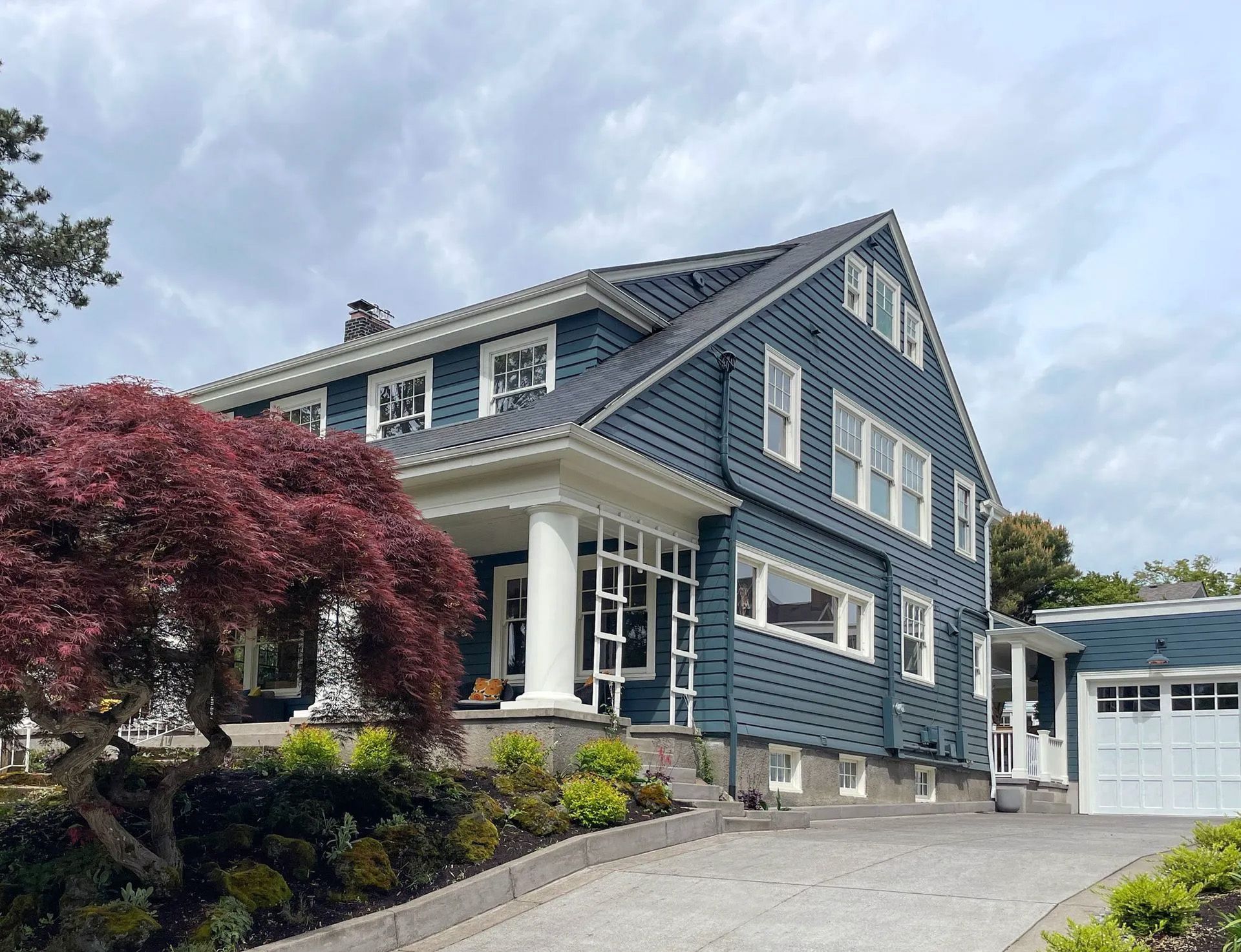 New garage addition for Dutch Colonial style home in the Laurelhurst historic district.