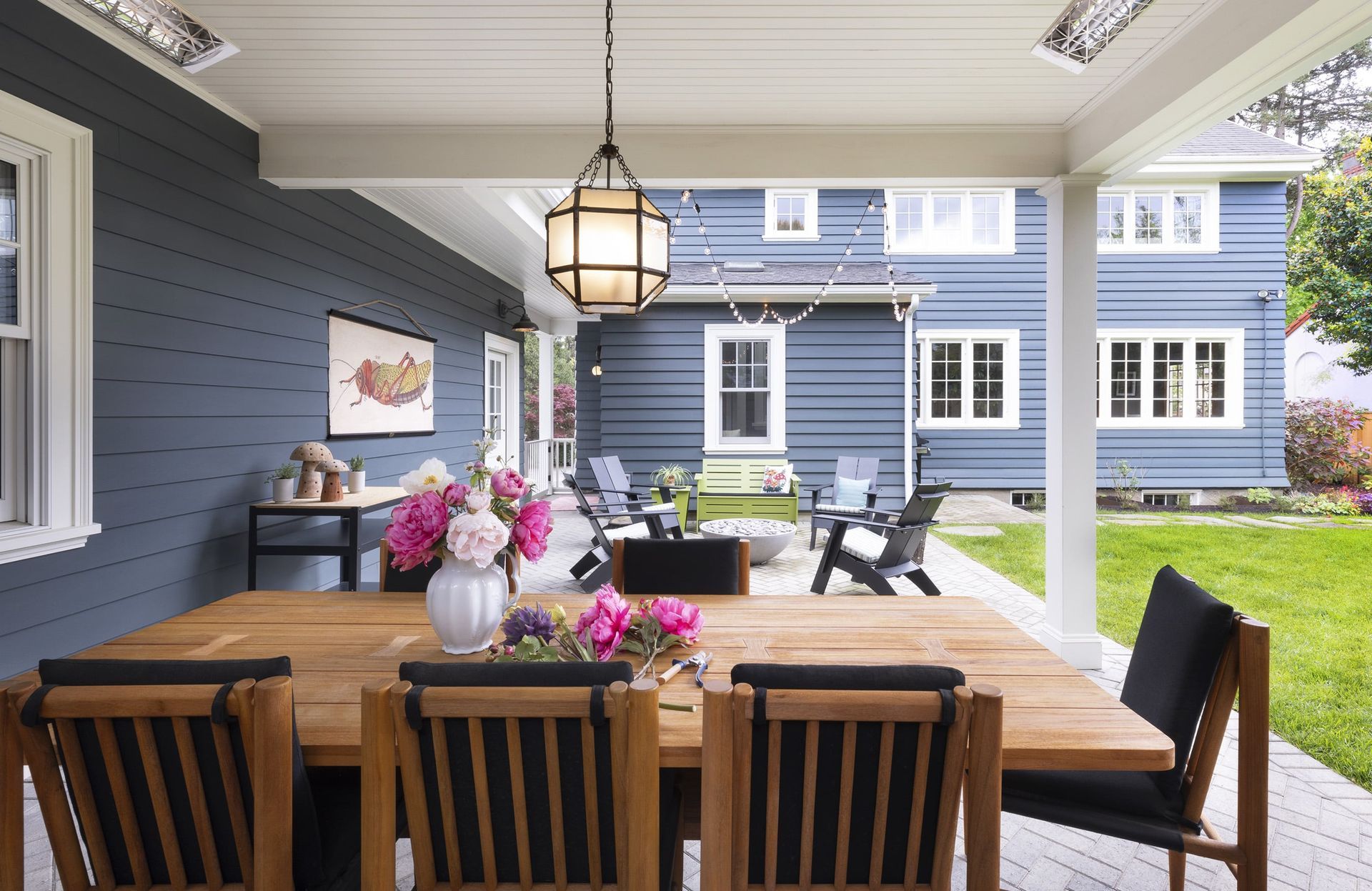 Next to the new garage, we created this inviting dining pavilion, offering the family year-round enjoyment.