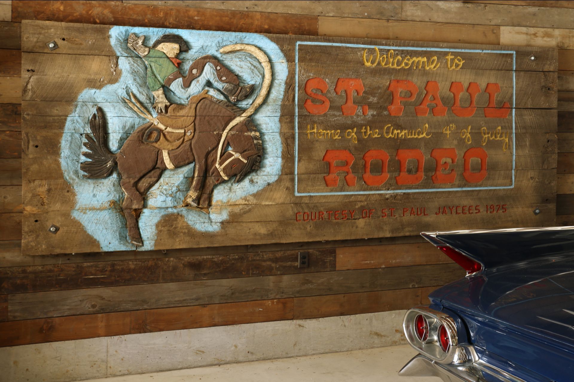 The garage’s old road sign for the St. Paul Rodeo recalls a fixture of childhood summers. 