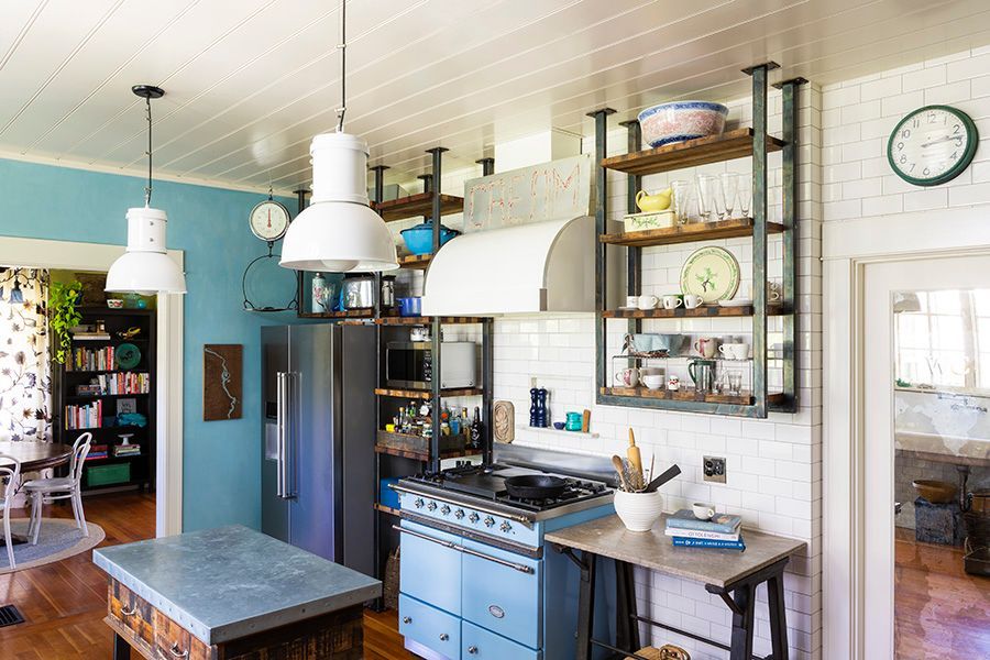 Inspired by the industrial 1920s, the kitchen is filled with meaningful and well-used items from cookbooks to colanders.