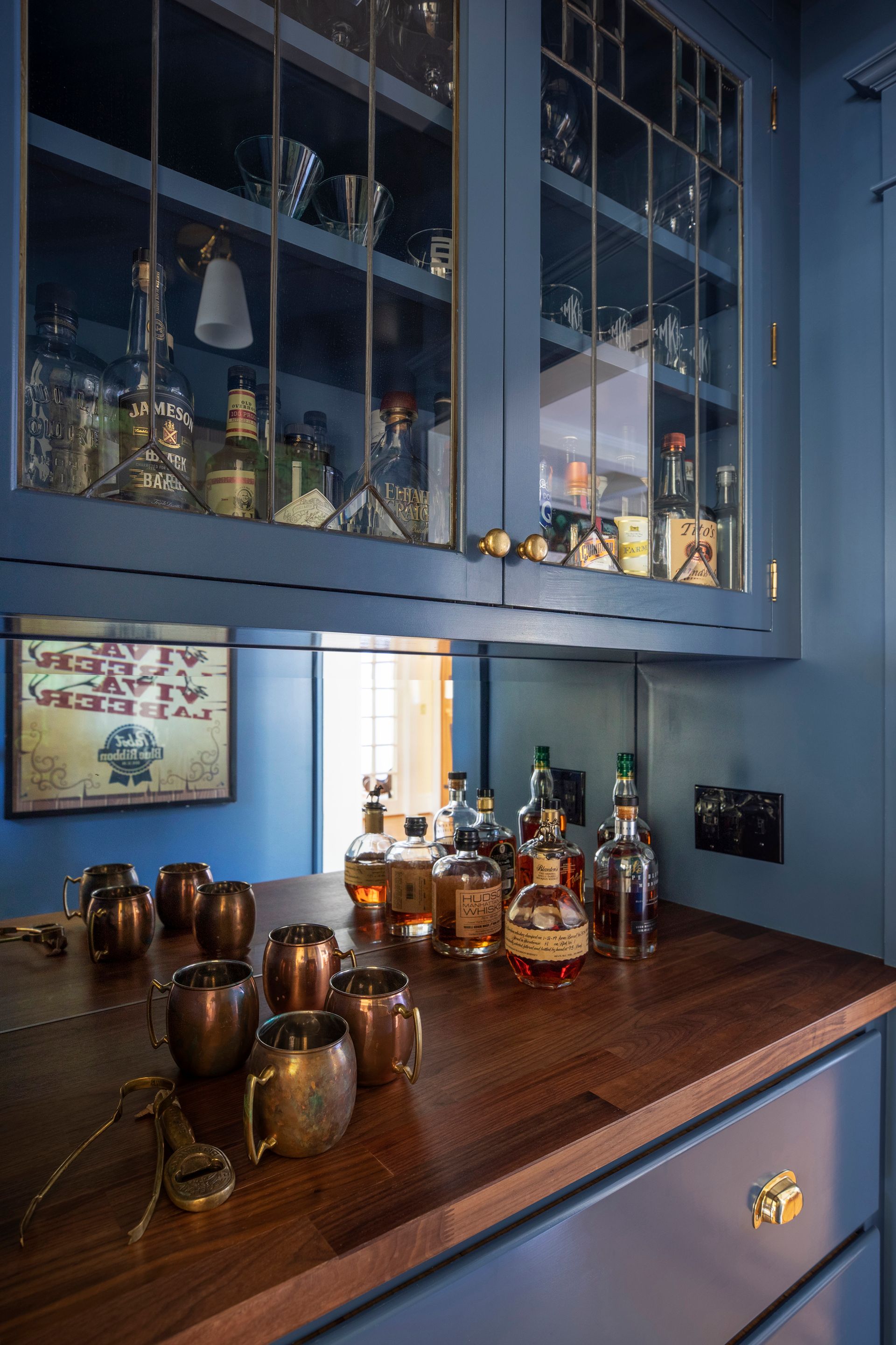 Close up of the new pass-through butler’s pantry's barware and built-in cabinetry