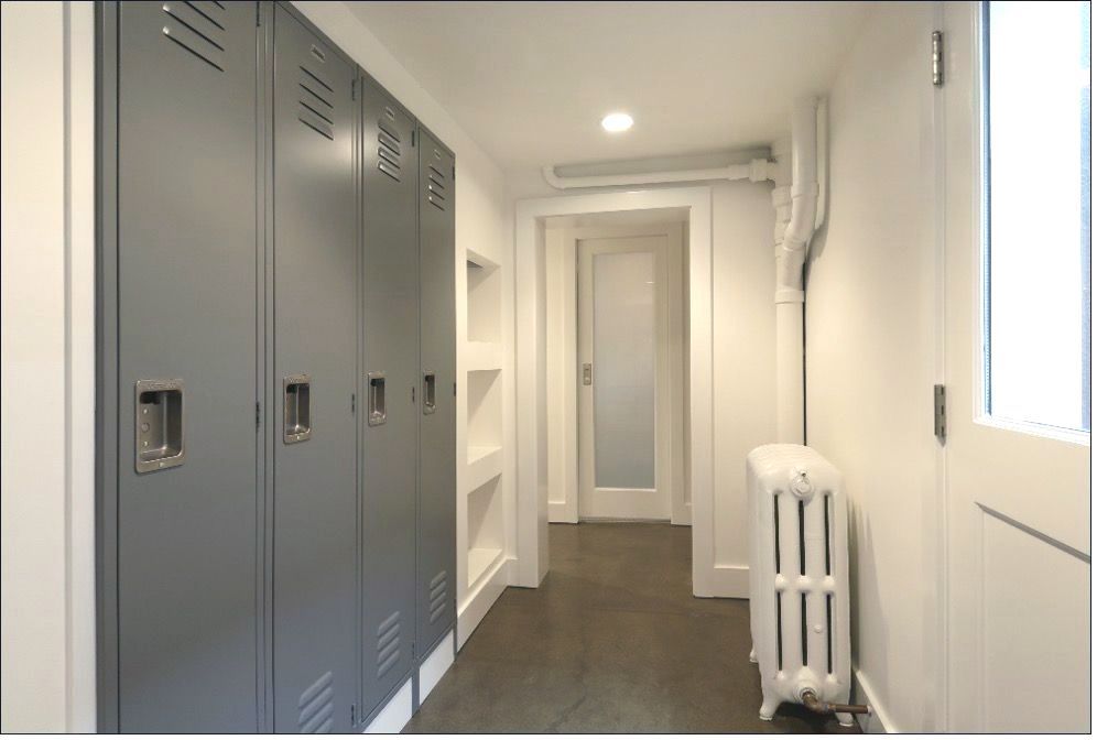 Plumbing stack that has been concealed in basement remodel