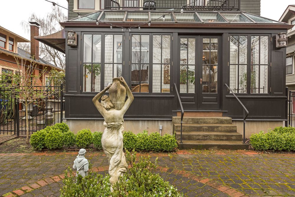 View of the new conservatory from the backyard, added onto the back of the house. 