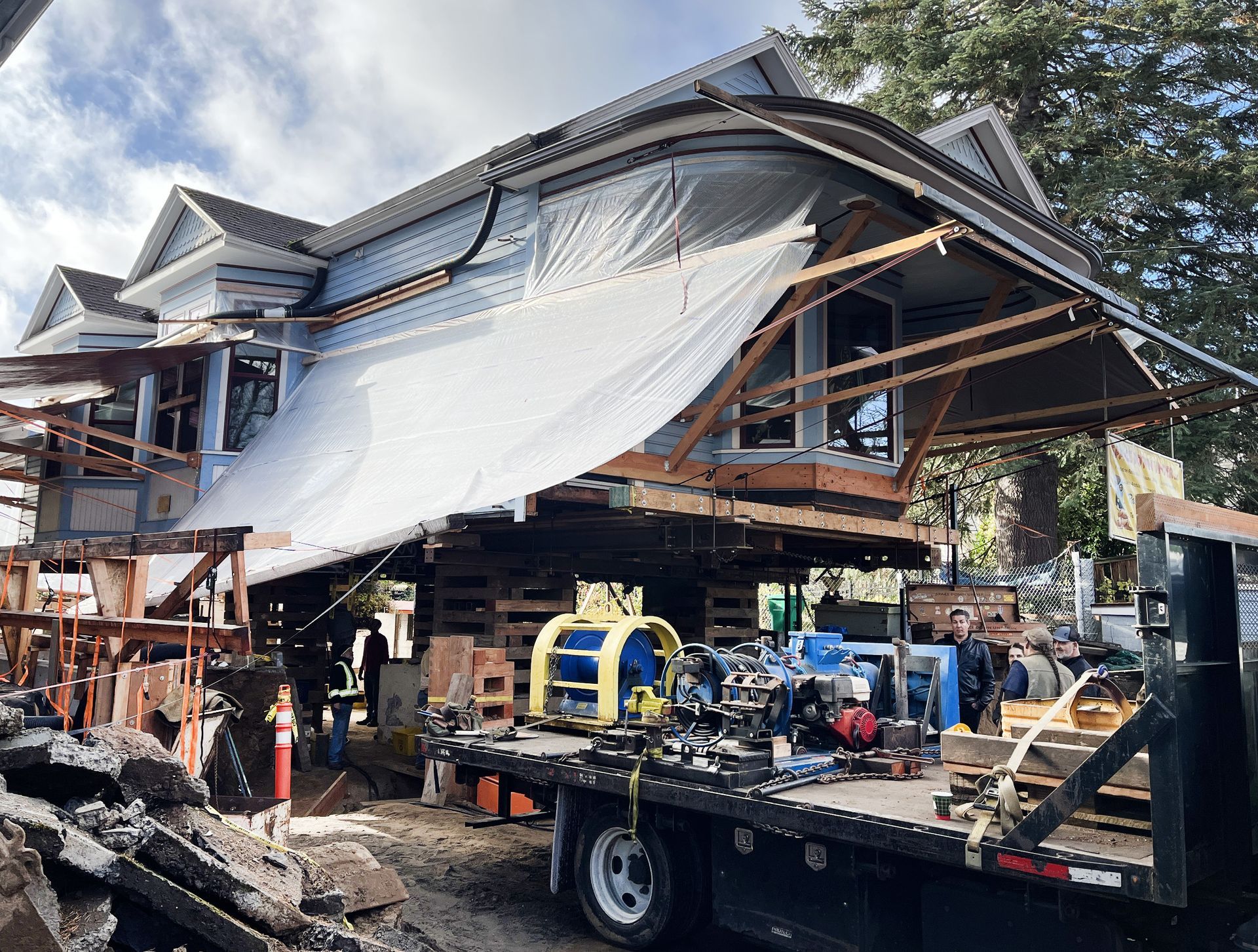 To create habitable space beneath this Victorian cottage in Sabin, the entire basement was removed and a new, deeper basement was dug out. The house was raised while the work was done, then lowered onto the newly poured foundation. Following completion of the basement, the upper floors will be renovated. 
