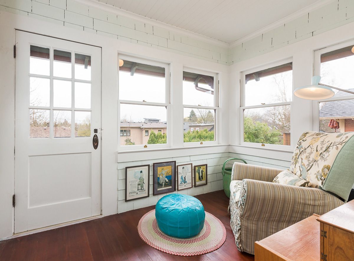 While a charming and pleasant place to relax with a book, this vintage sleeping porch is an ideal candidate for conversion to a second bath or laundry room. 